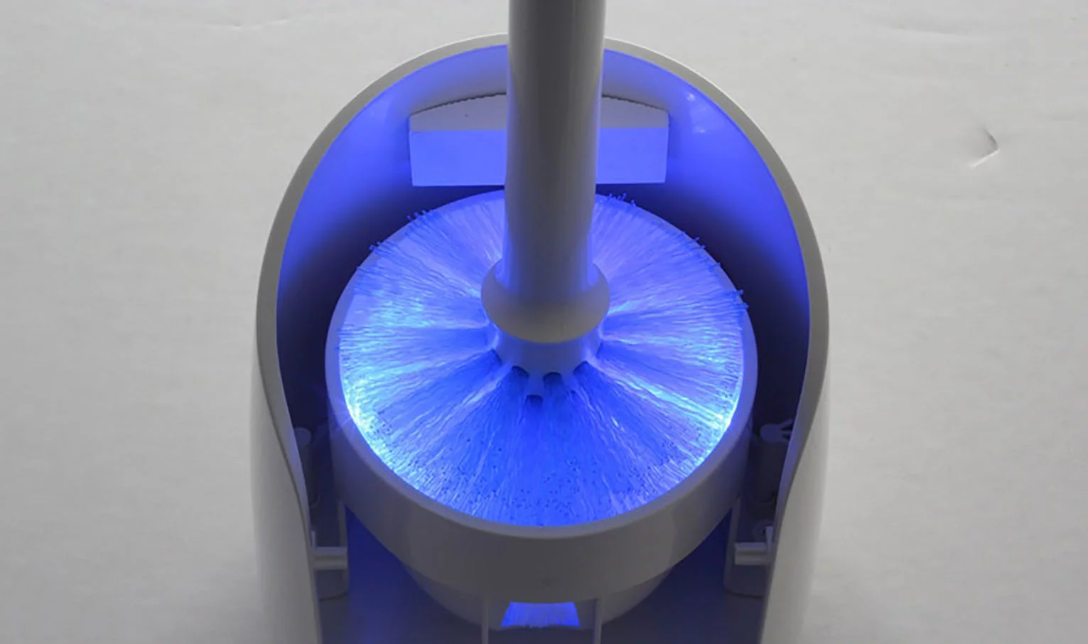 UV lights from all sides blast and sanitize the Lumi toilet brush after use