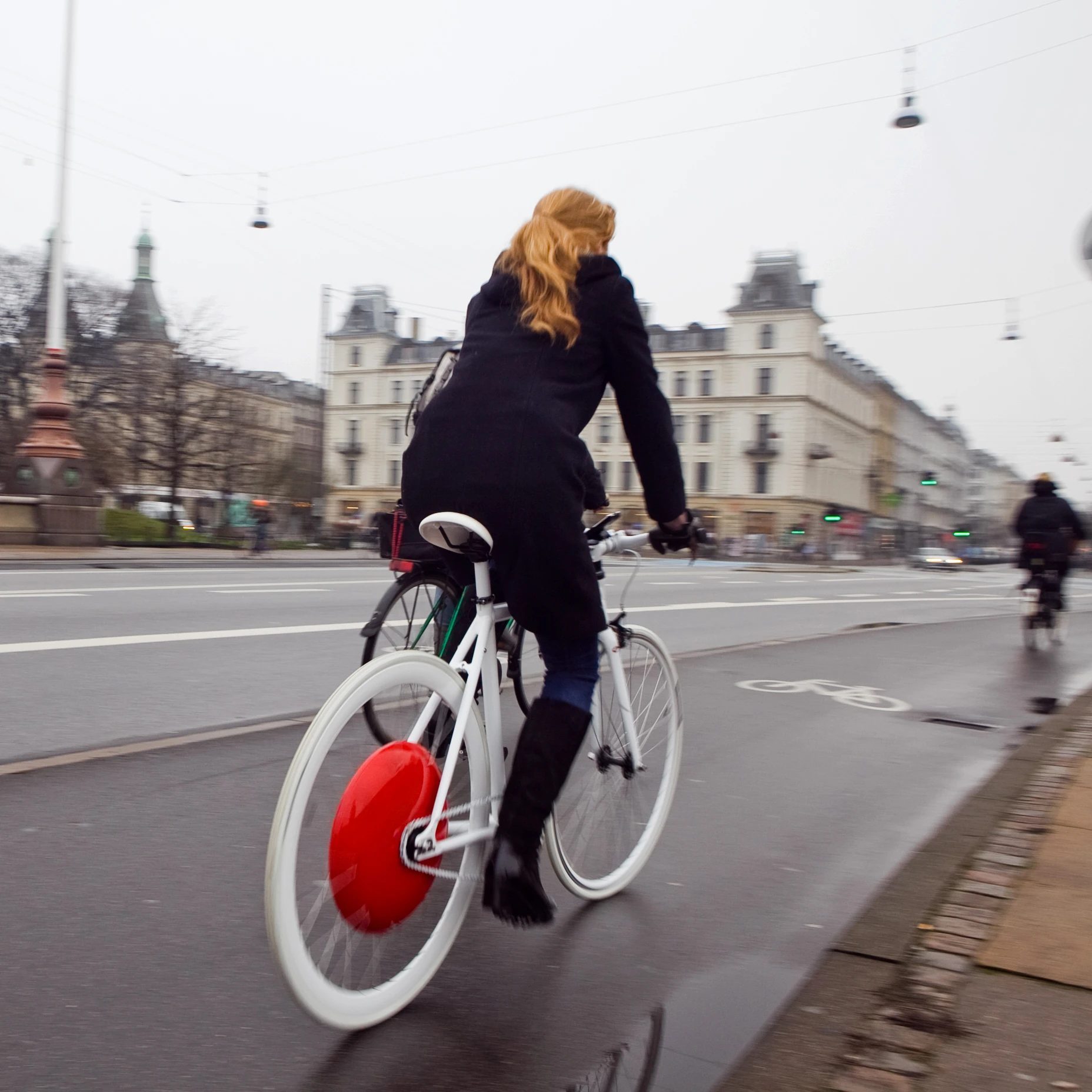 The wheel uses power generated from movement or braking and stores it in batteries in the hub