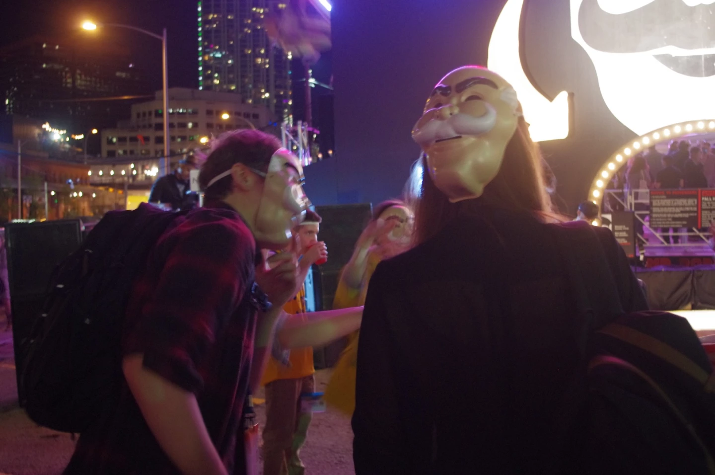 Attendees were given Monopoly man masks, which made the gathering feel a little surreal
