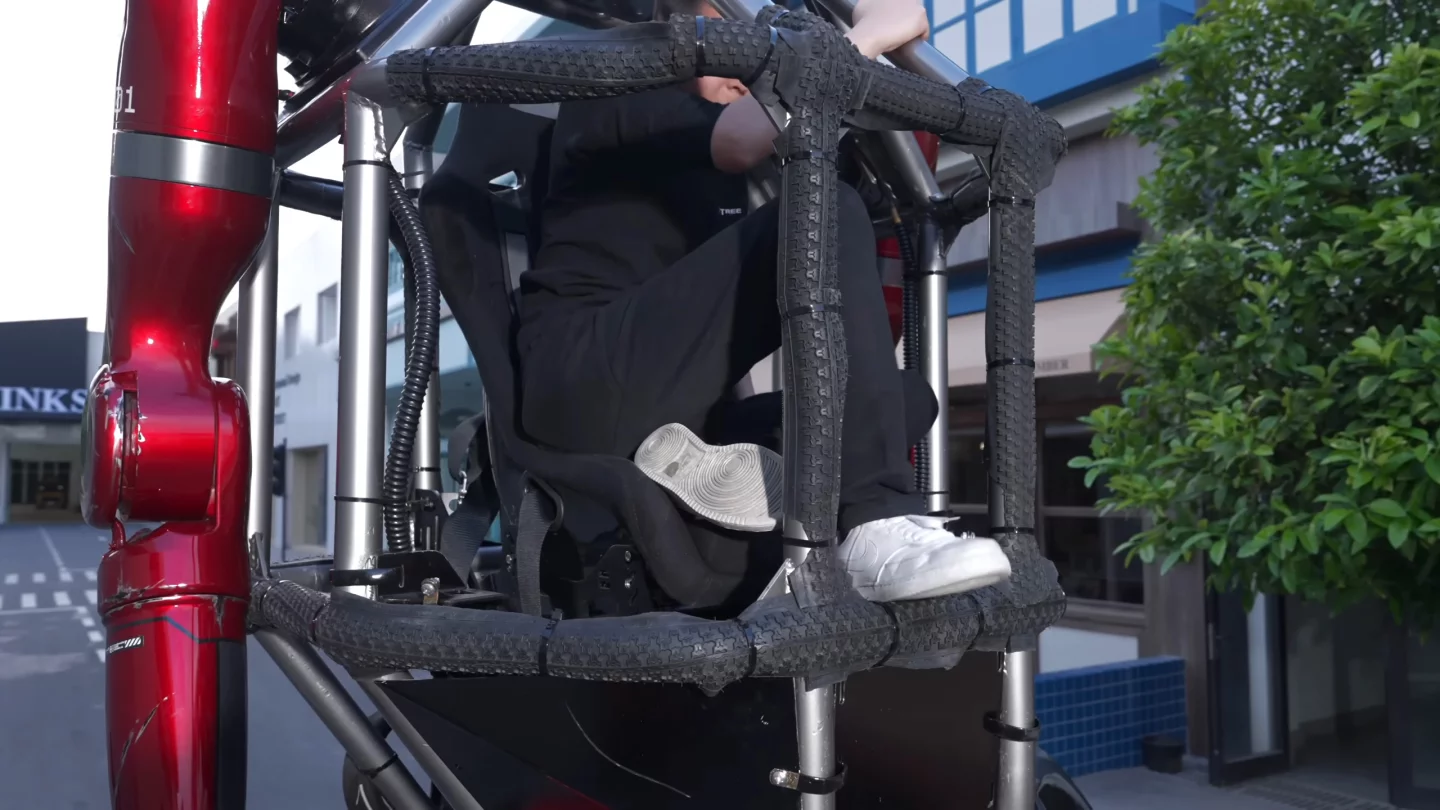 The scratched up paint job, zip-tied rubber tires on the frame, exposed wiring, and tricky ingress don't inspire much confidence
