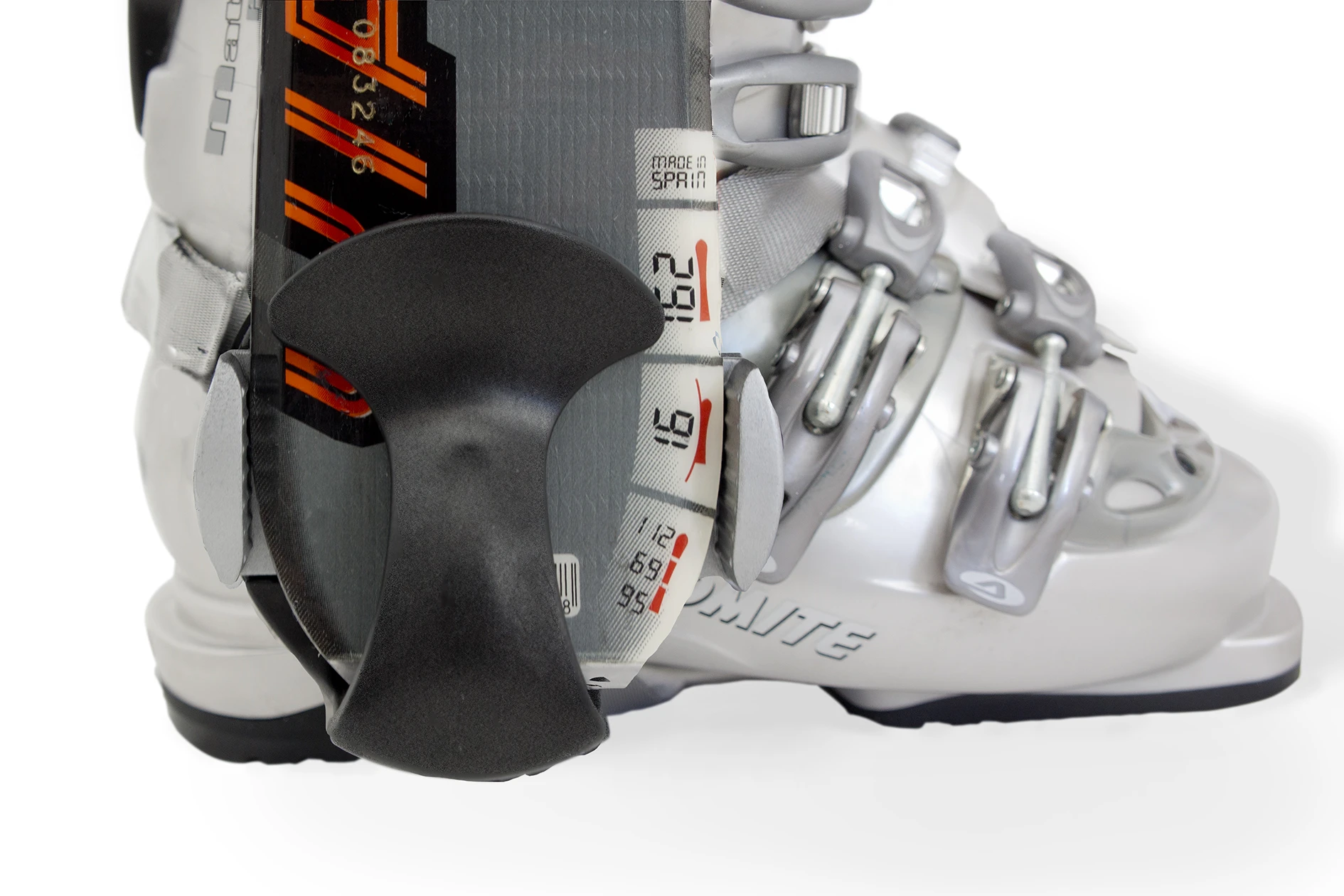 A clip cradles the bottom of the ski, while an adjustable-width guide adds some lateral stability