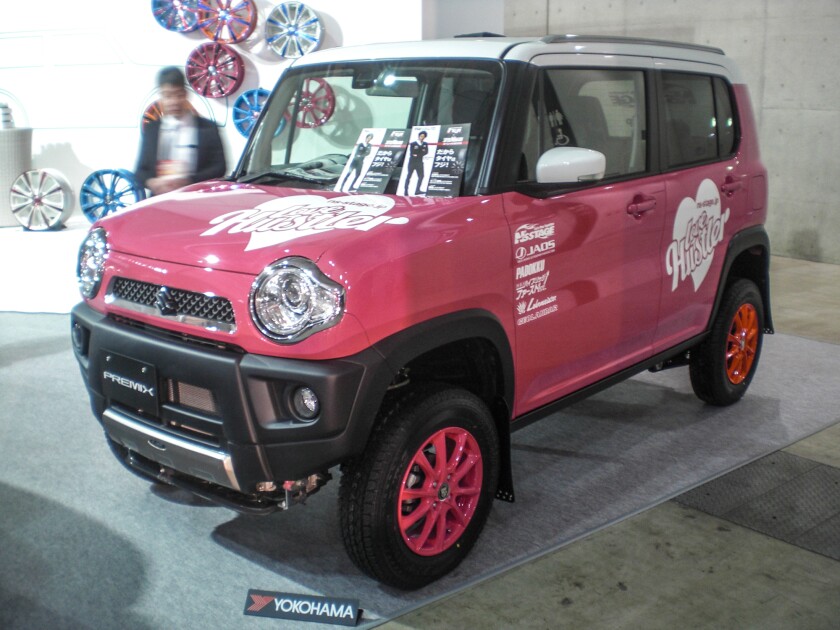 The Suzuki Hustler was the most prominent customized vehicle at the show – here Fuji and Style Auto try to emphasize the off-road side of the Hustler by raising the ride height, fitting large wheels ... and painting it pink (Photo: Stephen Clemenger/Gizmag.com)