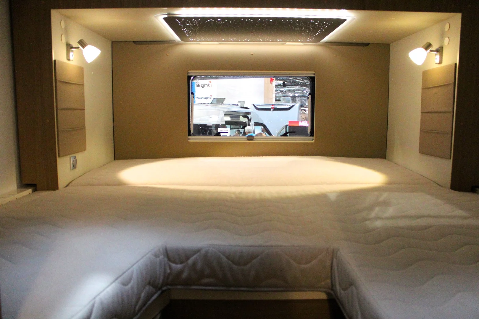 Adria uses a Lippert rear slide-out to house its bed