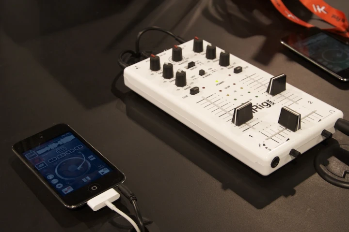 IK Multimedia's iRig MIX is a compact mobile mixer that can be used with the included DJ Rig app to mix tracks between two iOS devices