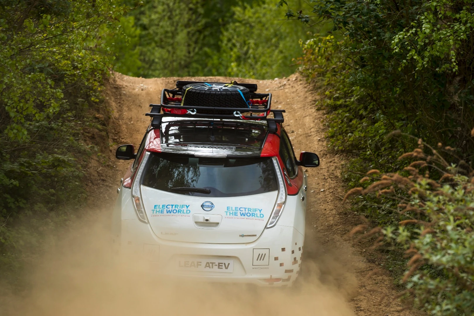 The Leaf AT-EV will kick up dirt and mud on its travels between the UK and Russia