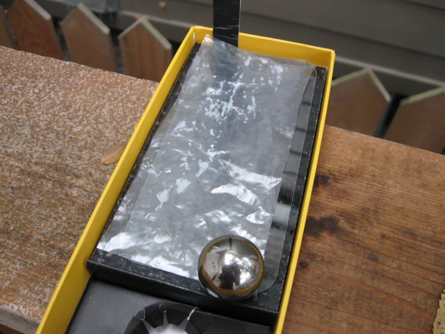 Two pieces of Ziplock bag plastic also kept the glass from breaking ...