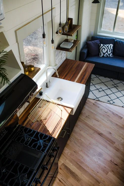 The inside of the Legacy tiny house is a treat of lovers of fine woodworking