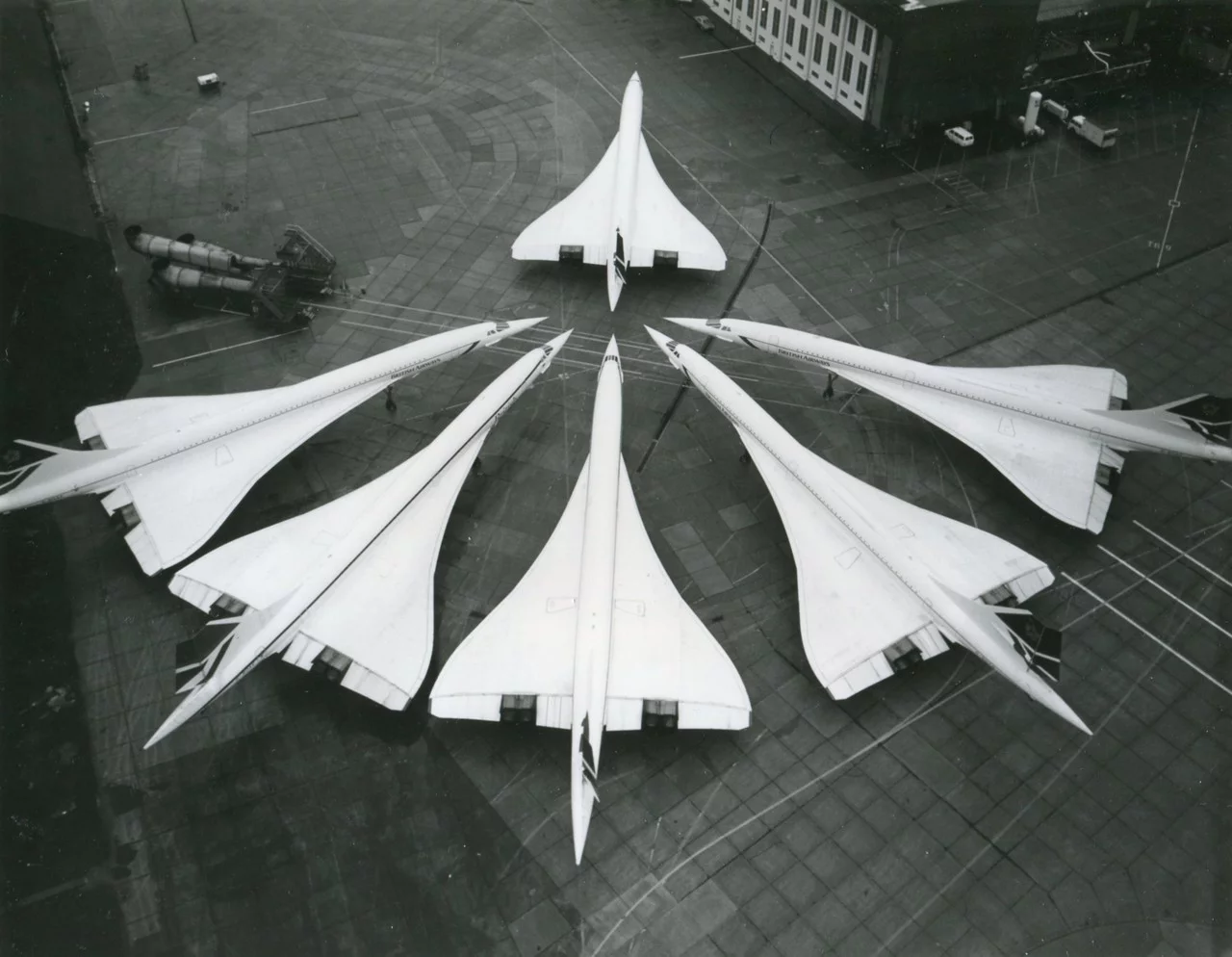 Six Concordes parked on tarmac