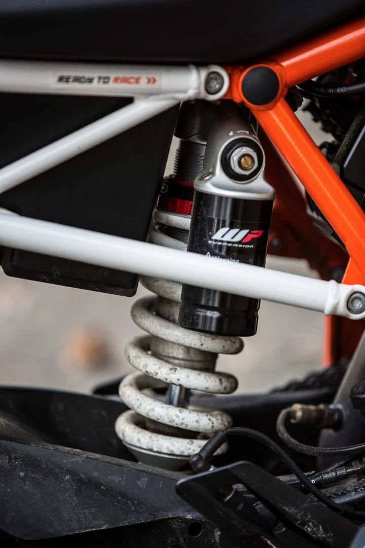 The KTM 1290 Super Duke R's WP rear shock is adjustable for preload, rebound, high and low speed compression – but it requires tools