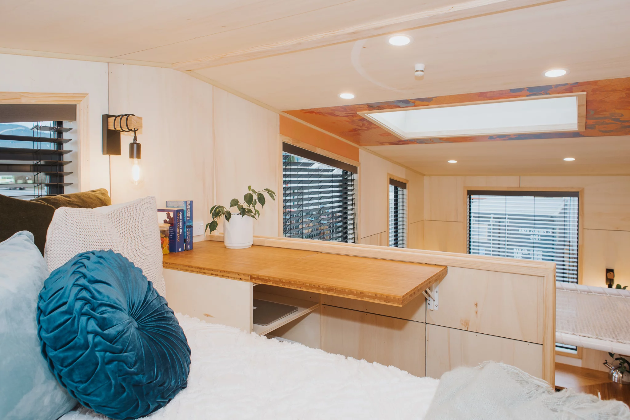 The Autumn's bedroom has a small folding desk area for working from home