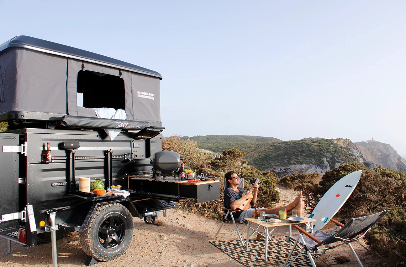 The slide-out kitchen comes empty, and users can top it with a portable gas stove, grill or other cooking equipment