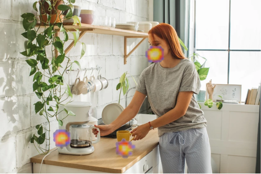 Where are the noises coming from in this picture? According to the SoundCam Go, from the coffeemaker, the mug, and her mouth