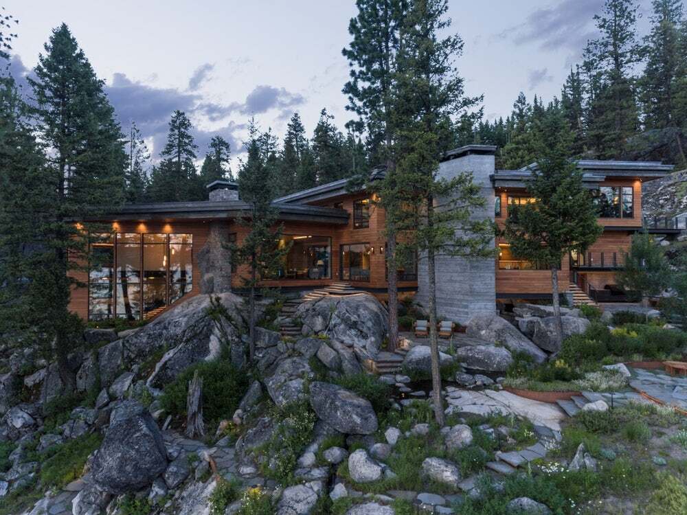The Cliff House sits on property that features discrete rocky walkways that wind down to the lakeshore