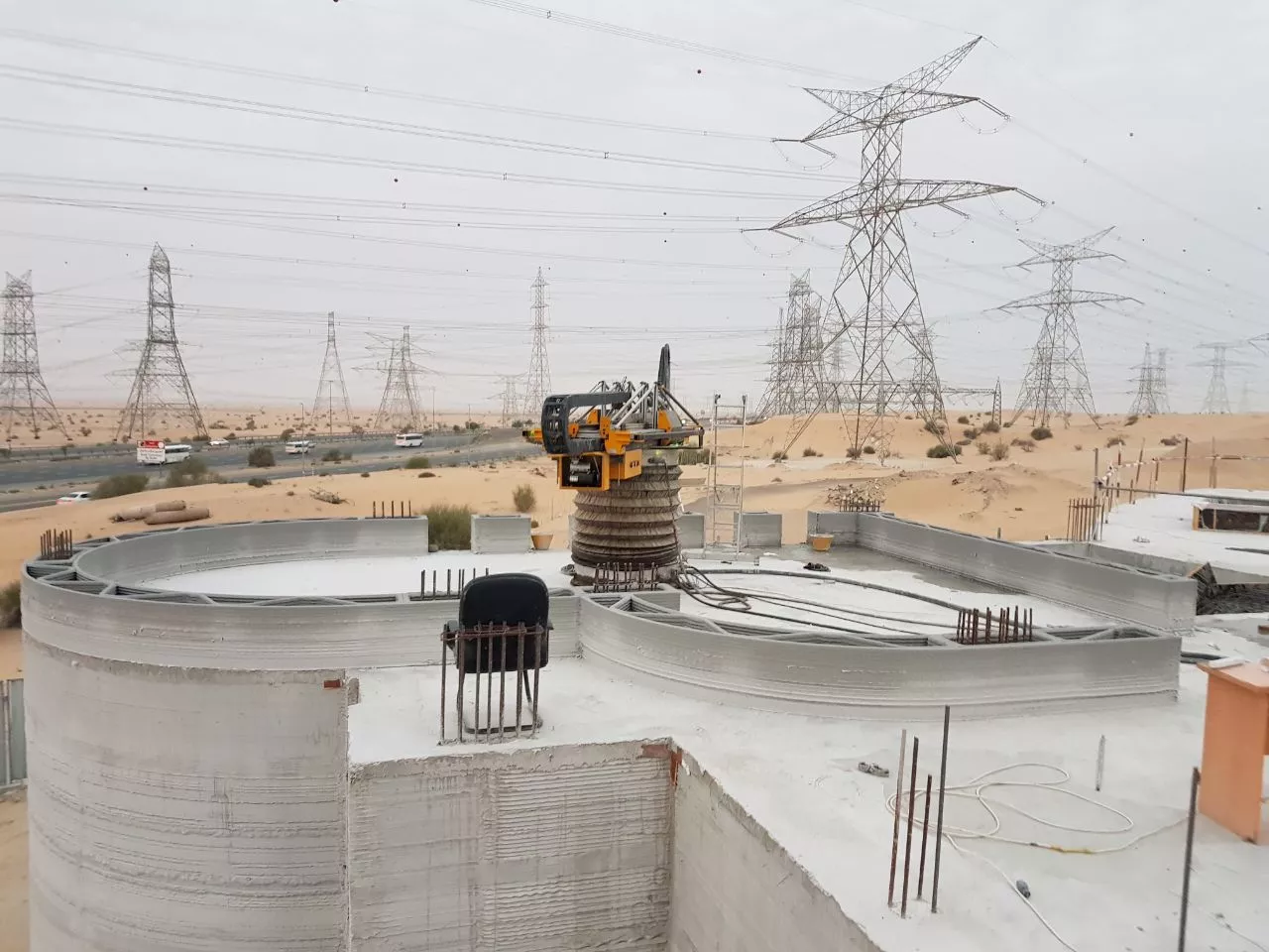 Apis Cor's 3D printer is portable and was moved around the building site using a crane during the