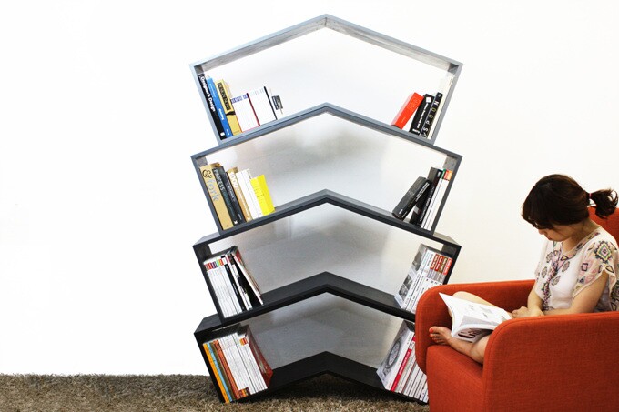 The Lean/Bookshelf by monocomplex is a remarkably elegant and comely approach toward the storage and display of a collection of books