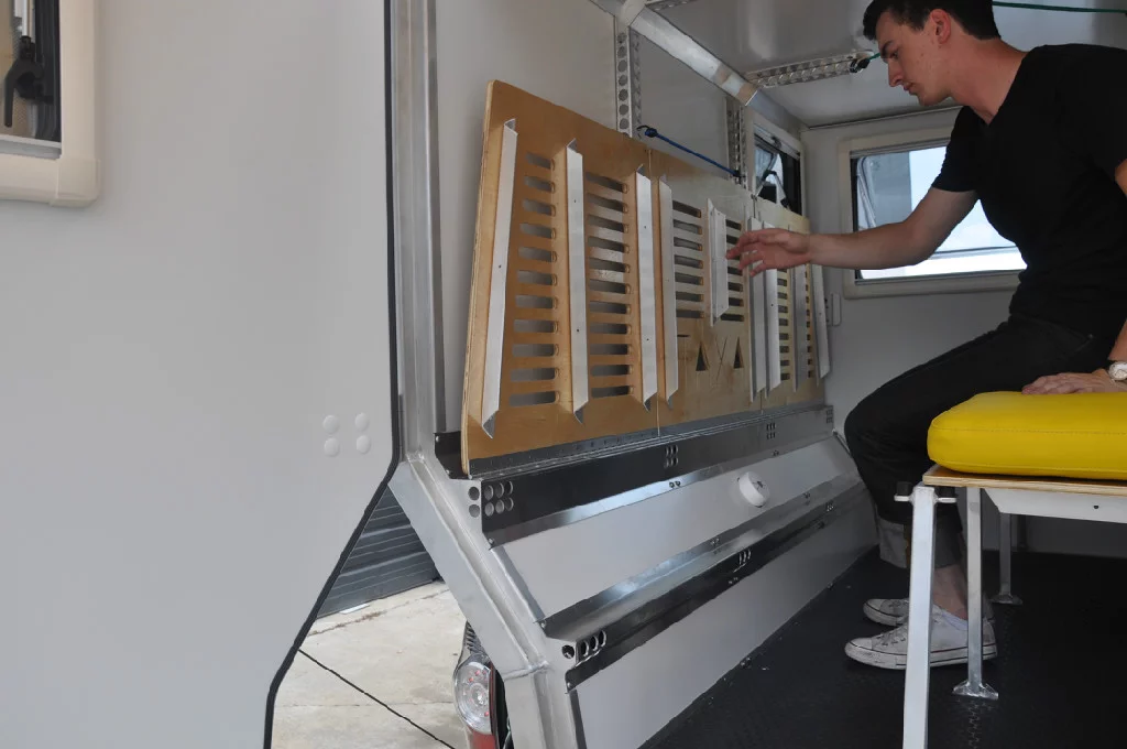 The beds fold up to open up the interior