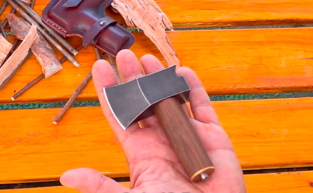 Ridiculously tiny axe is actually a multitool that starts its own fire