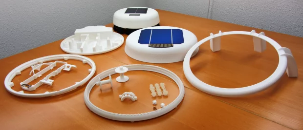 Scrobby disassembled to show its plastic components