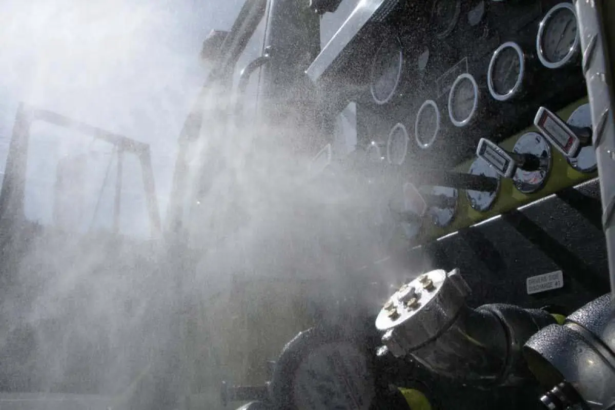 The HeatSeeker is a cooling mister that replaces the existing hose port cap on a fire truck