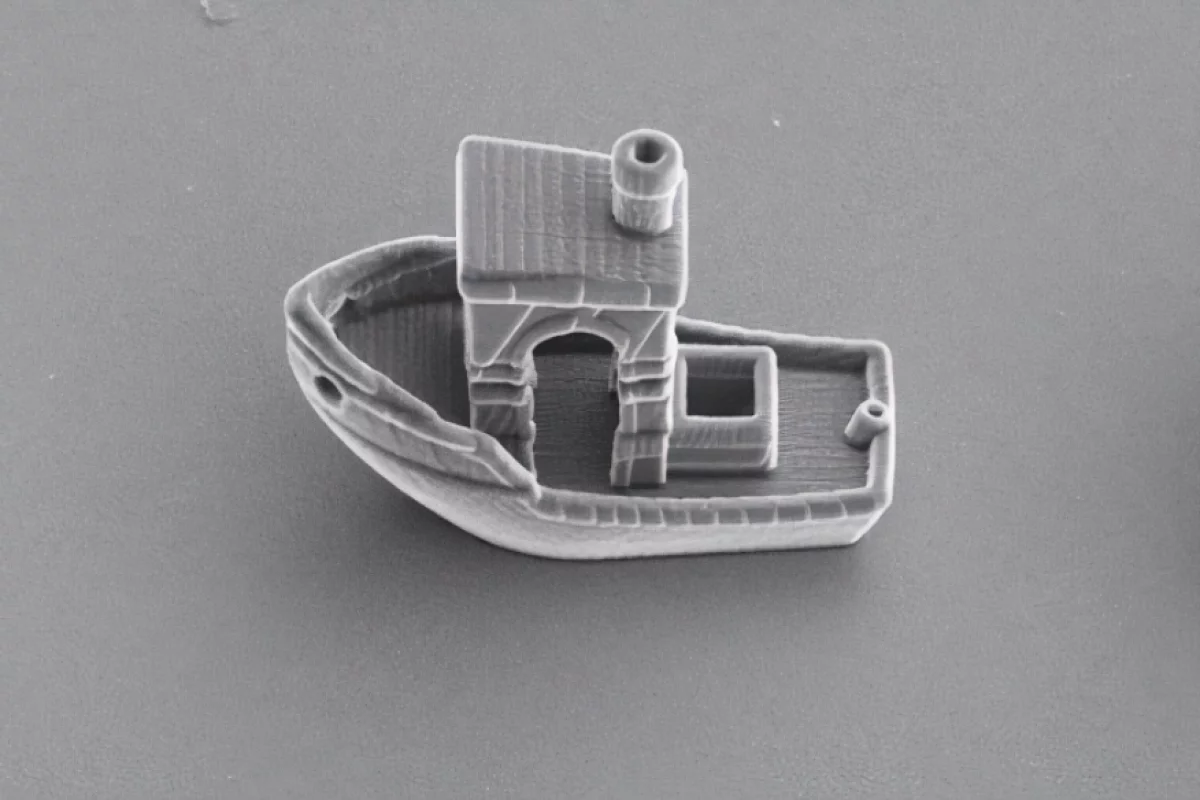 3DBenchy is a tiny 3D-printed boat, just a third of the thickness of a human hair