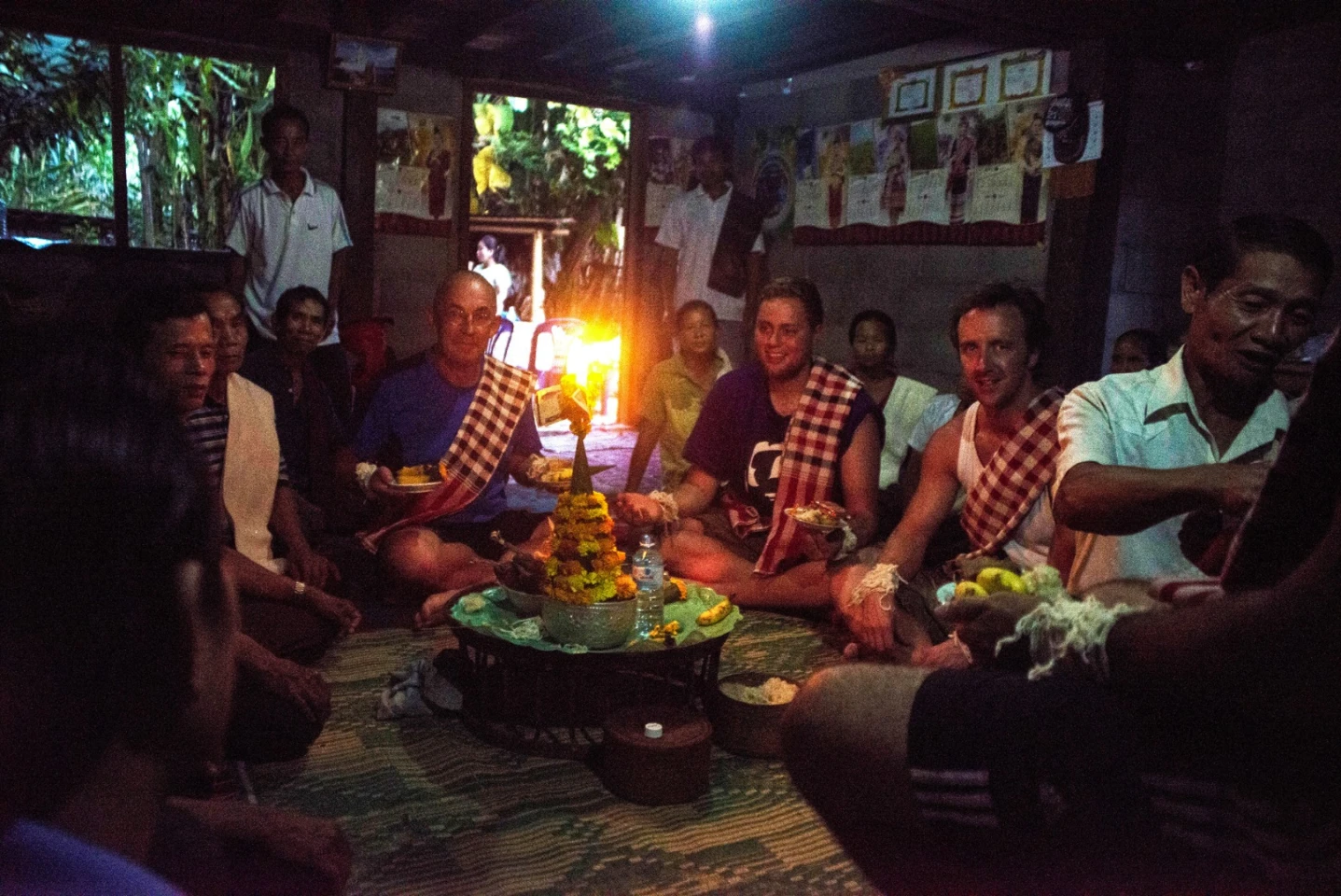 One of the three Baci ceremonies we experienced as we visited each village. These ceremonies are deeply heartfelt. Mike, Josh and Charlie being royally welcomed.