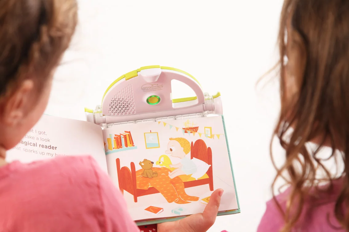 The Sparkup Magical Book Reader is a device which allows children to hear recordings of their parents reading their favorite books to them