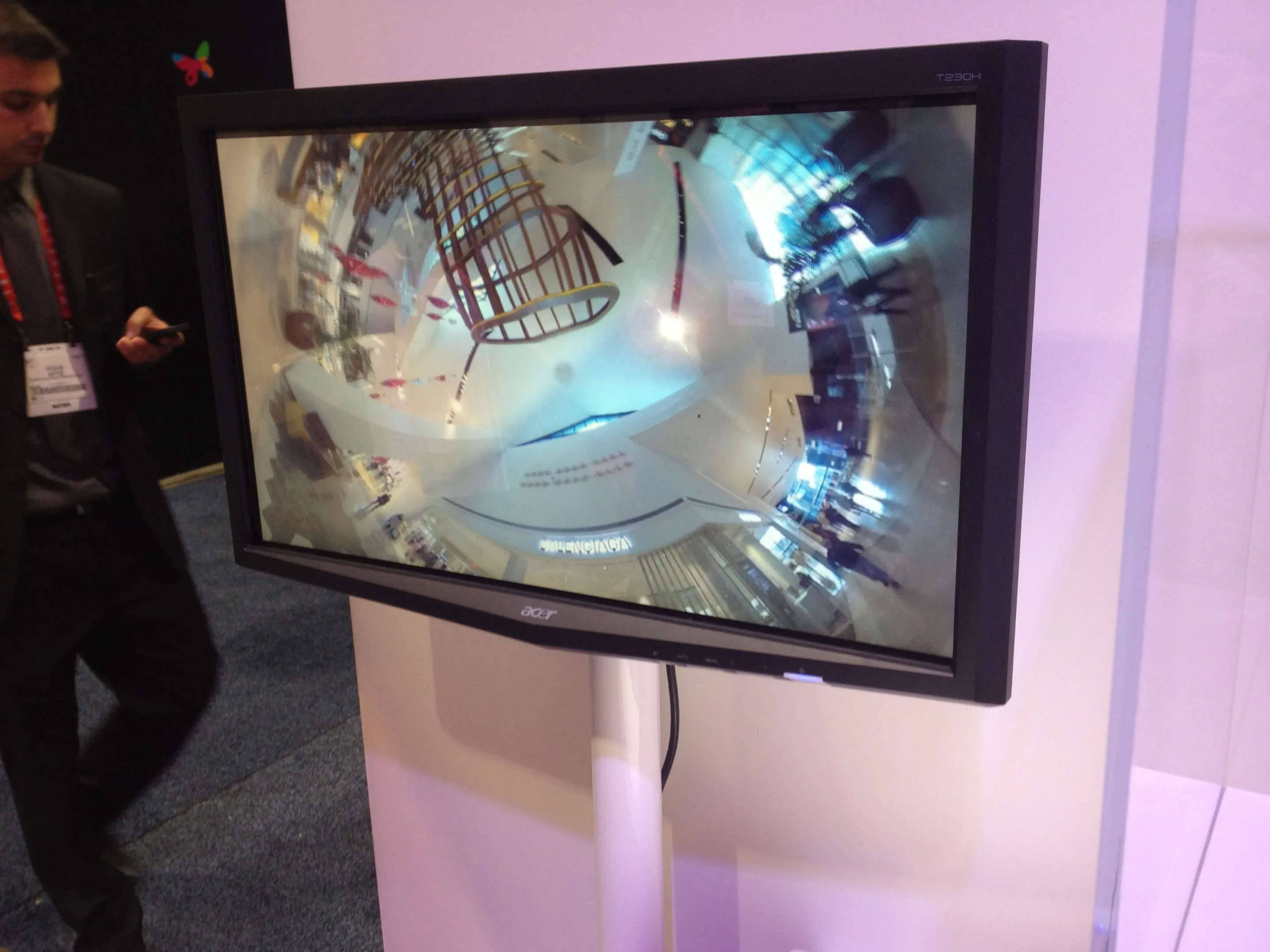 The screen shows a photo taken with Ricoh's new 360-degree one shot panoramic camera