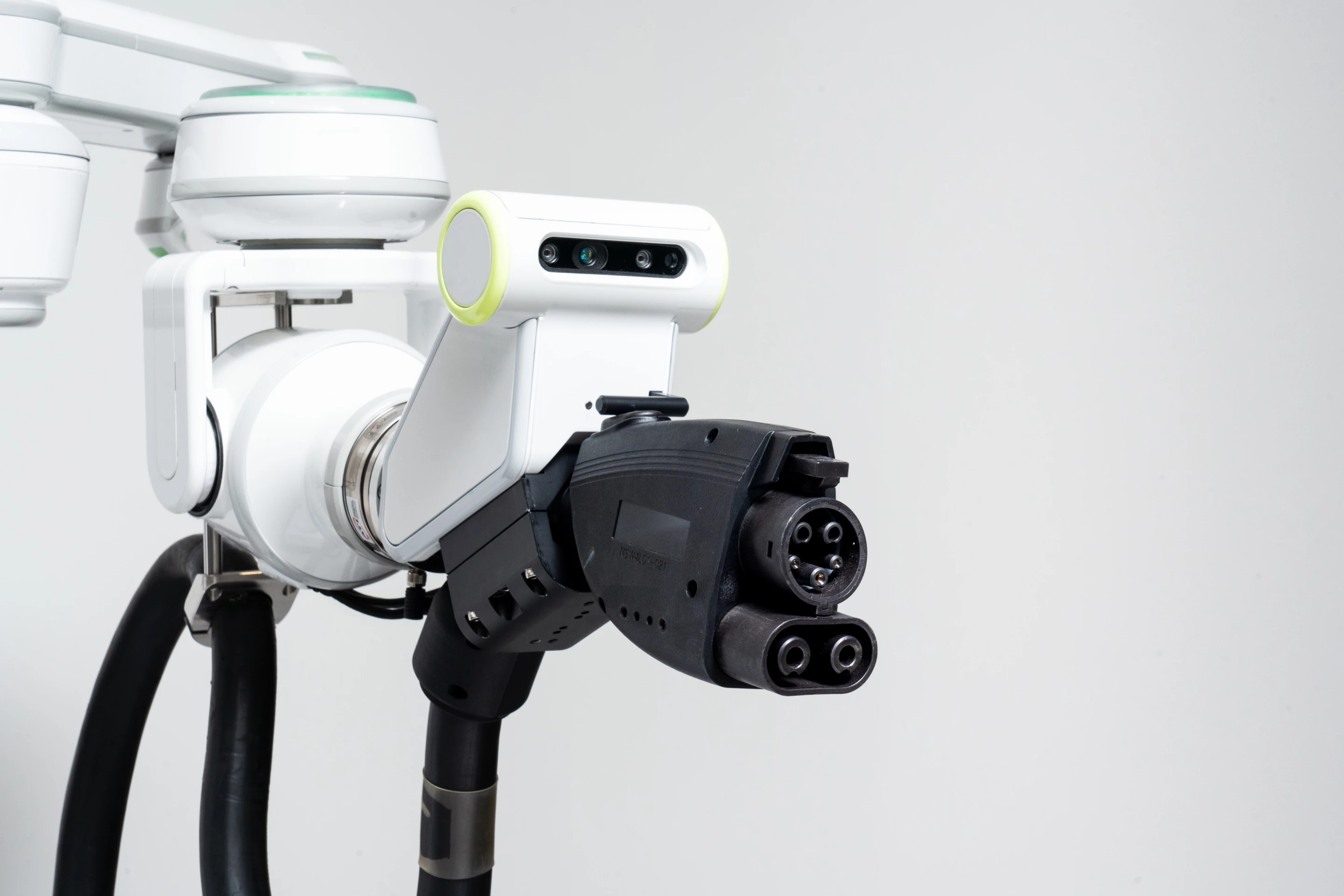 The ACR uses its sensor and control hardware to precisely line up the charger and vehicle charging port, and then connect the two