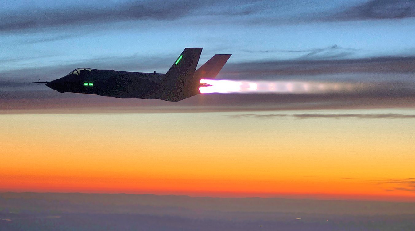F-35C on full afterburners at night