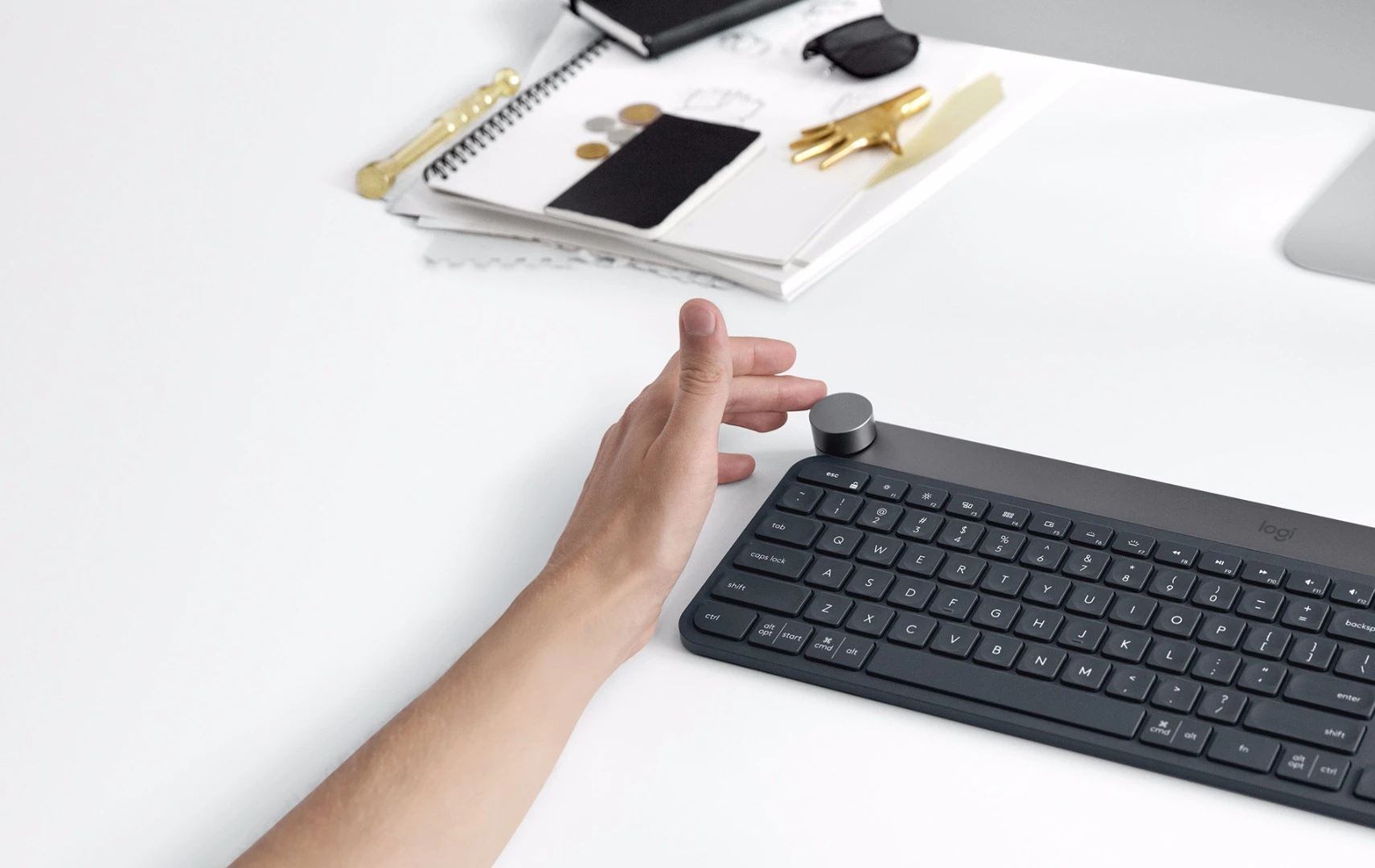 Craft keyboard users can activate and control context-specific functions in software running on a PC or Mac using the multifunction dial