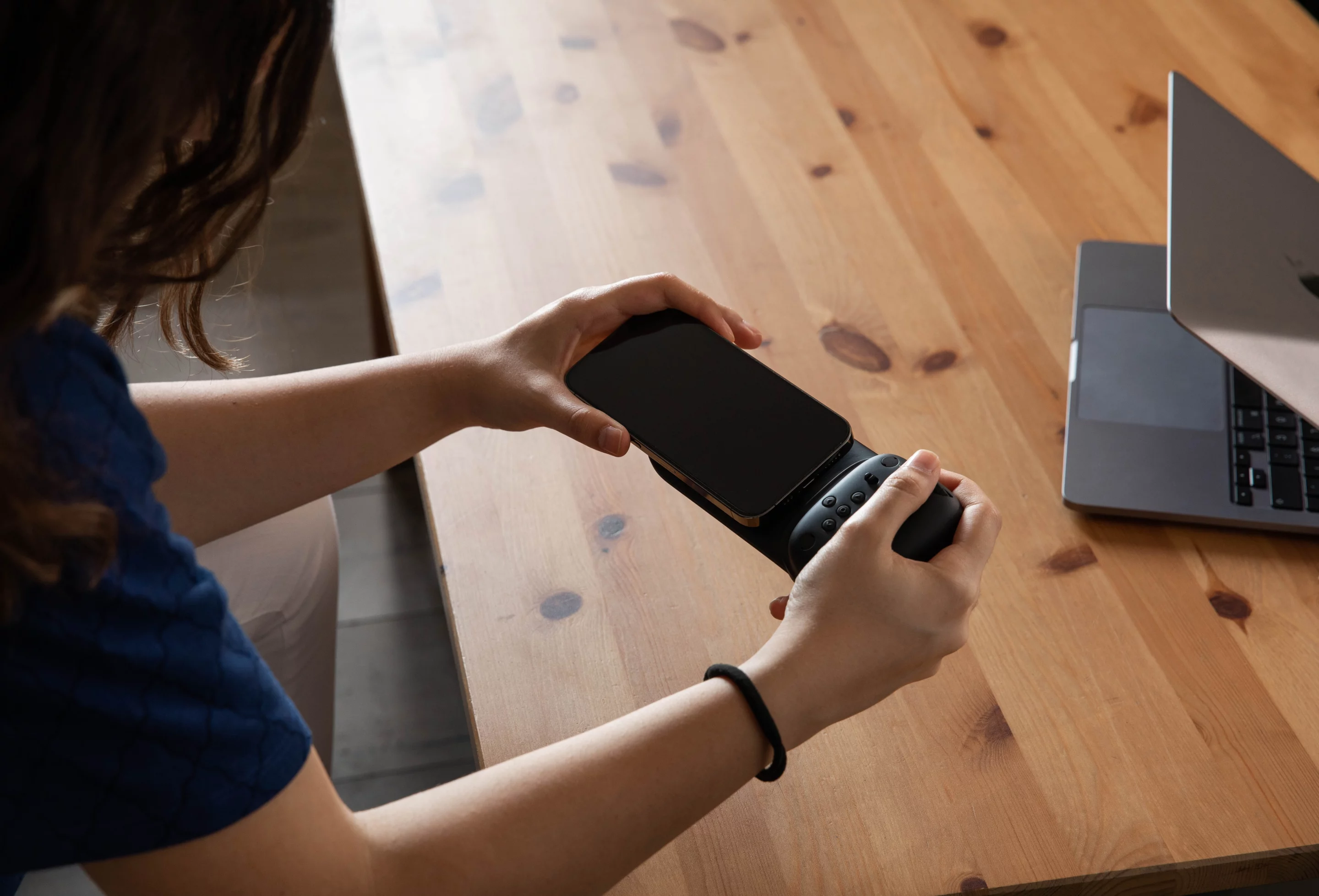 An iPhone equipped with MagSafe can mount directly to the Spark, those without will need the supplied MagSafe sticker