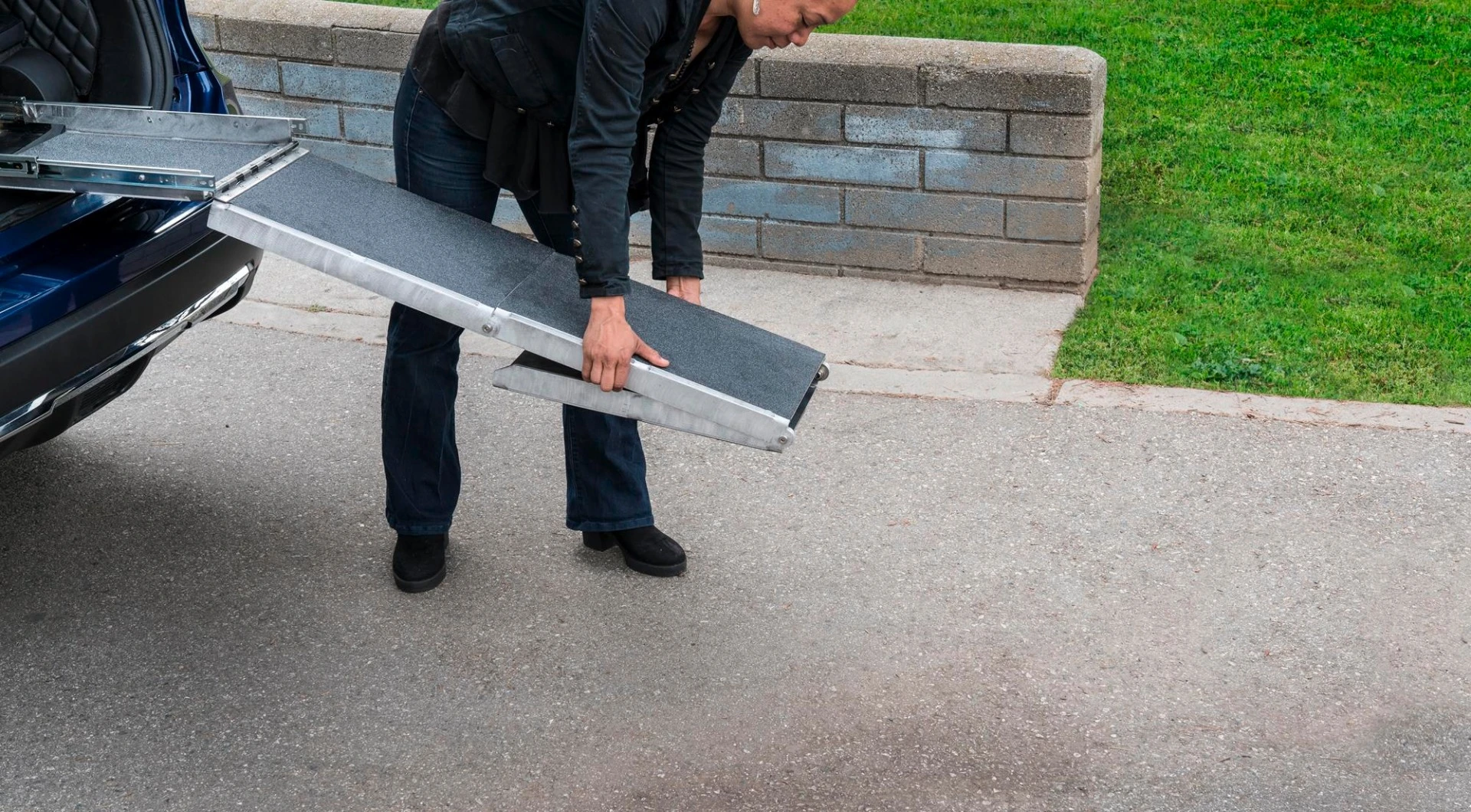 This slide-out, fold-out dog ramp to help Fido get in and out of the Rogue Dogue is a pretty good idea, we think