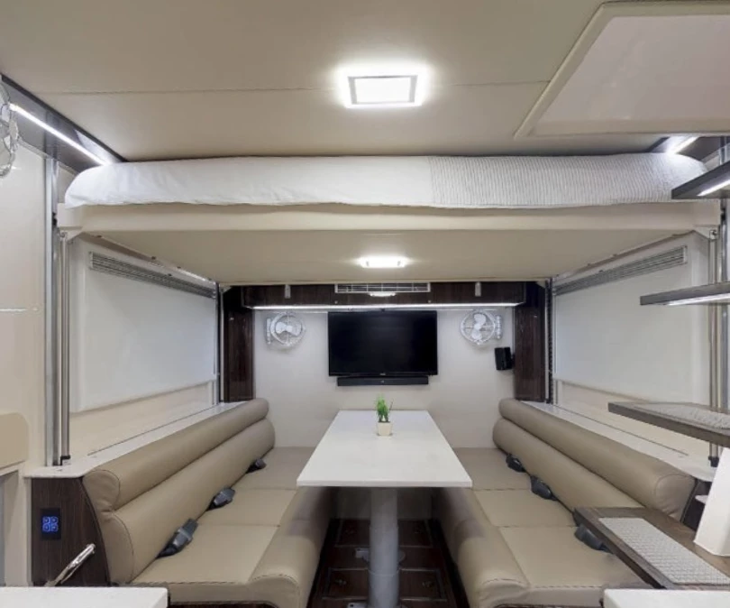 The large dining area has two four-seat benches