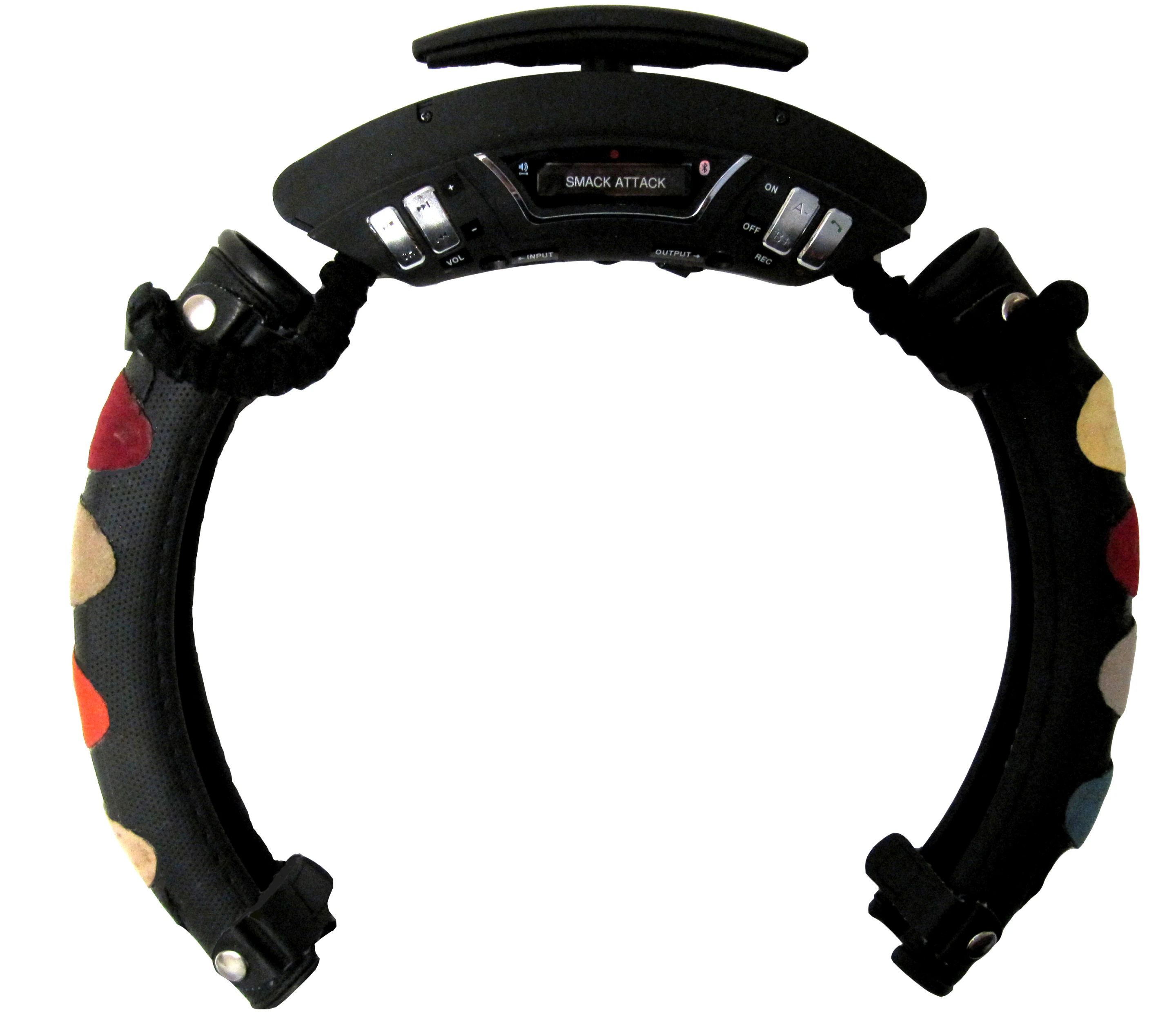 The cover slides over the steering wheel, is secured in place with straps and then turned on