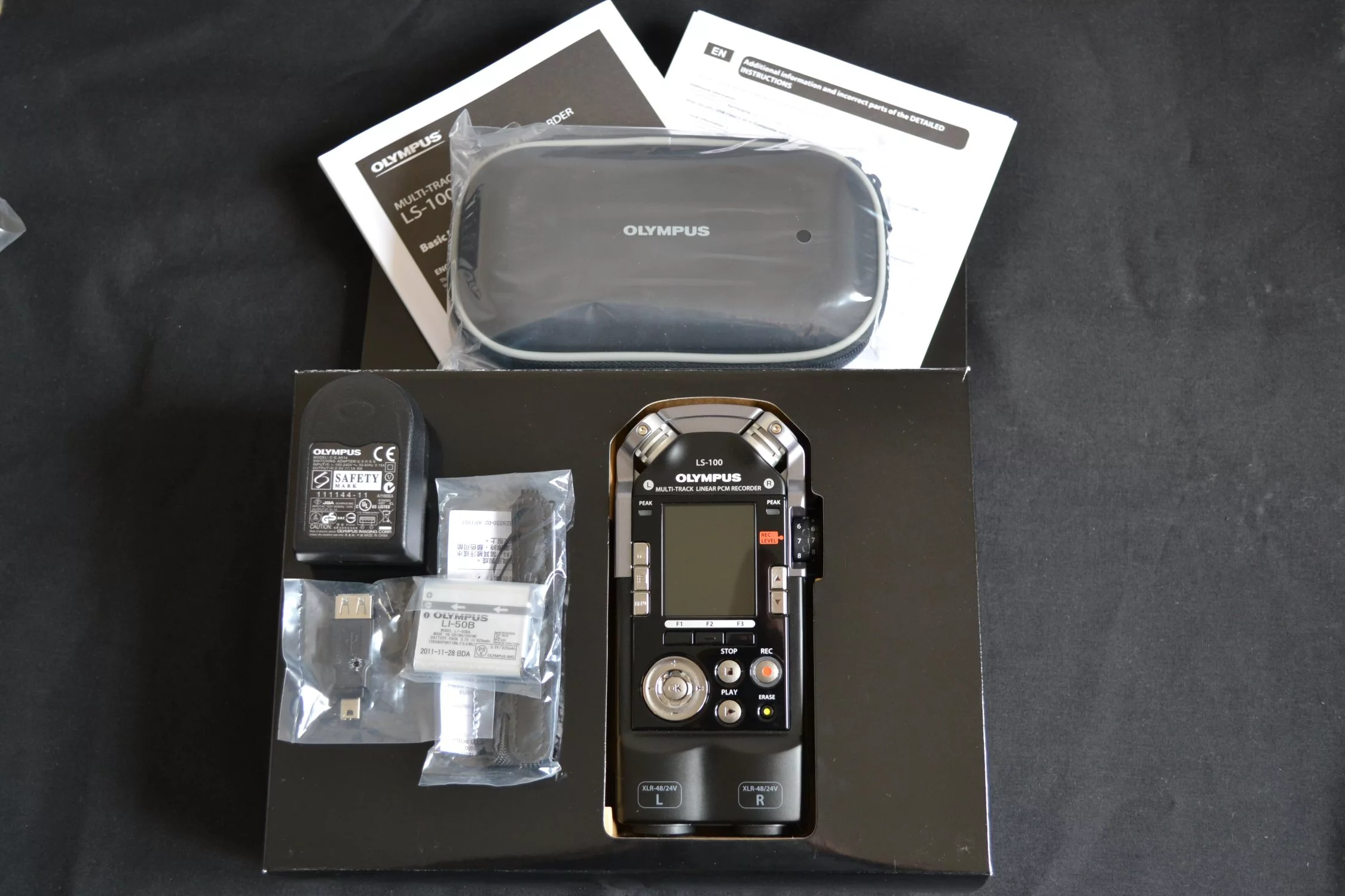 The box contents, including the LS-100, carrying case, USB cable and AC adapter