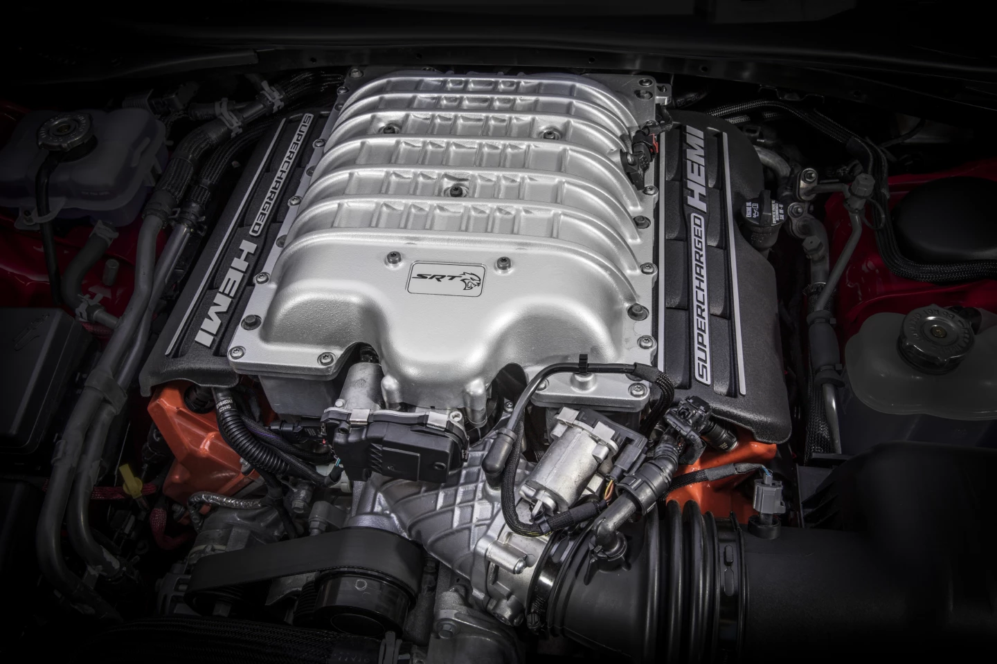 The 6.2-liter V8 found in the Dodge SRT Hellcat starts with 717 HP and works it way up to 807 in its top-most, supercharged iteration