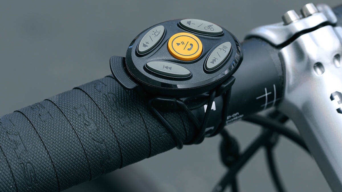 The Coros SafeSound helmet is controlled via a handlebar remote