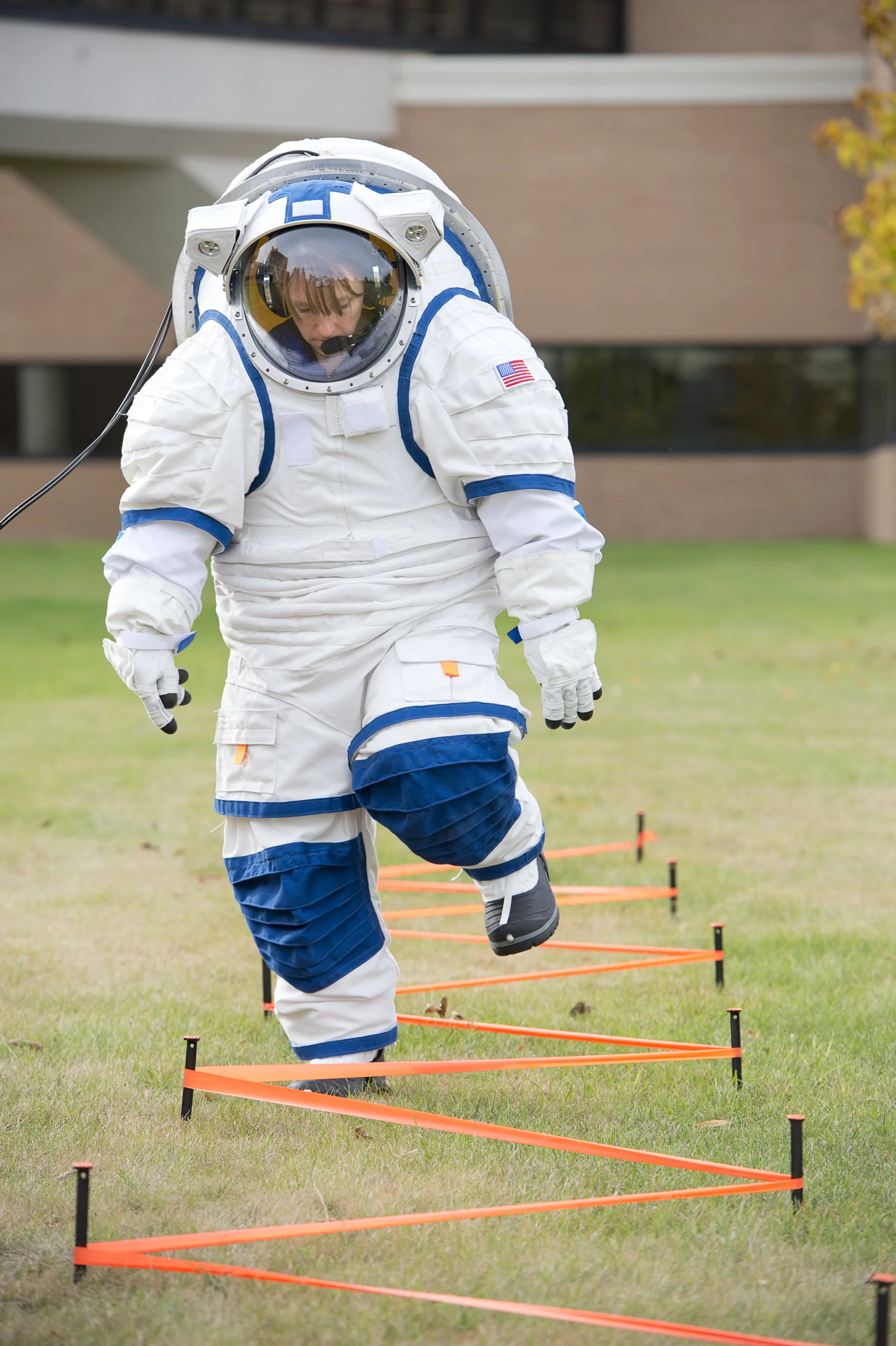 University of North Dakota's NDX-2 suit tester, Tiffany Swarmer, negotiating the obstacle course (Photo: Pablo de León/Tiffany Swarmer/UND Aerospace Network)