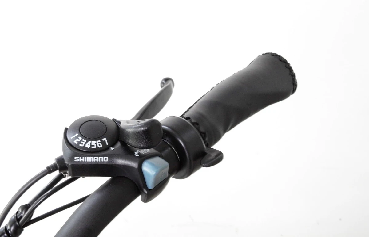 The throttle on the Air-33 eBike sits with the seven-speed Shimano shifter on the right handlebar