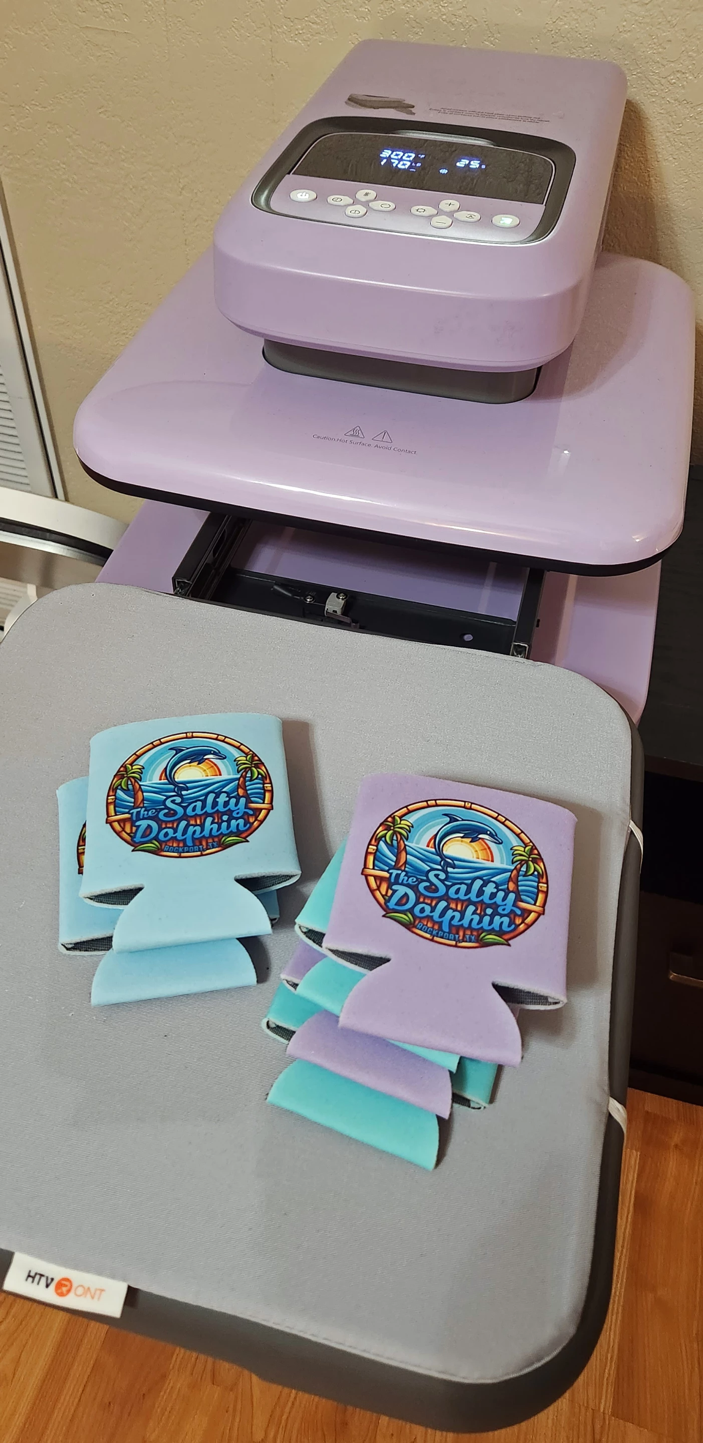 The 15x15-inch workspace on the Auto 2 is big enough to press six koozies at a time