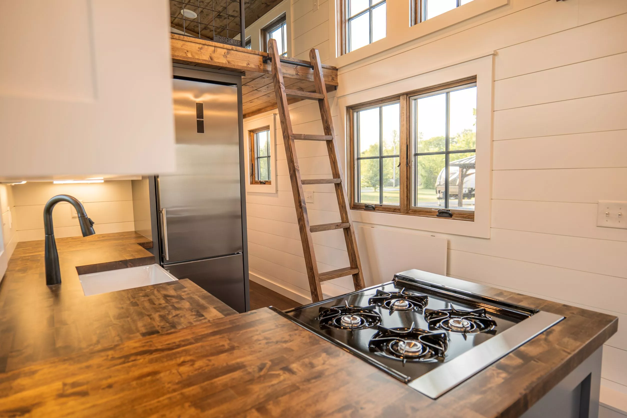 The Teton's loft bedroom is reached by a removable ladder
