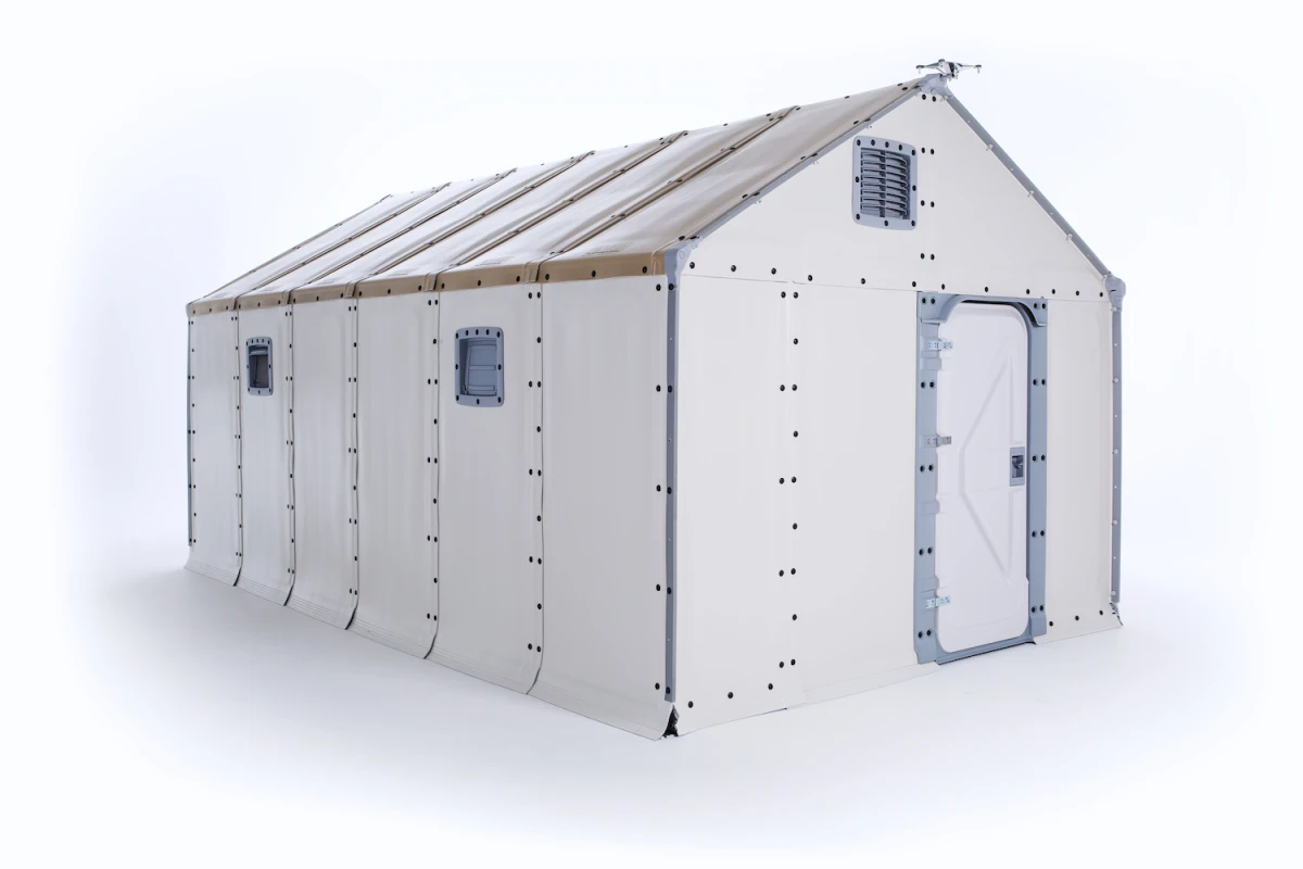 The Better Shelter includes windows, a locking door, and a solar panel on the roof