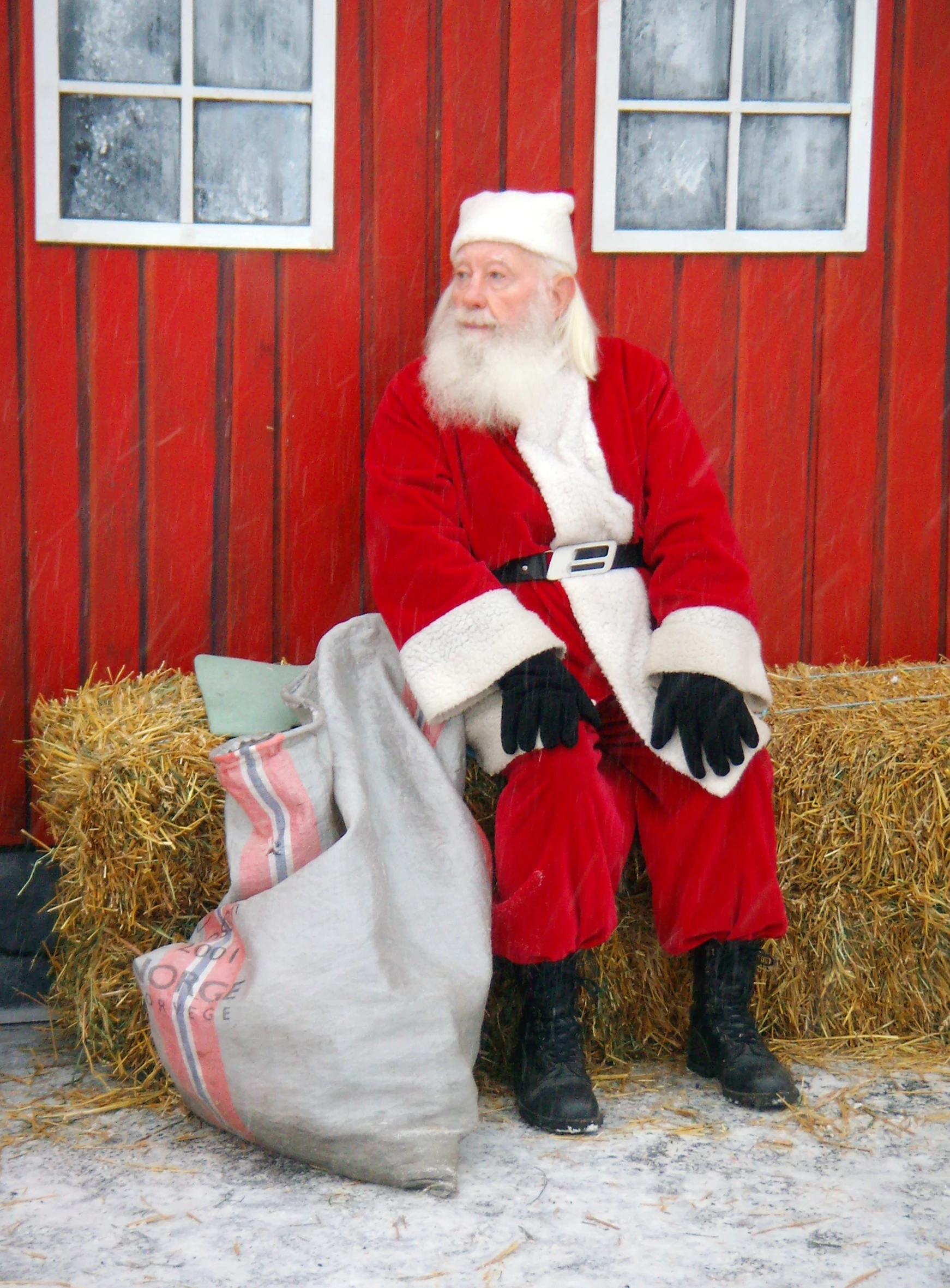You can call Santa and leave a message, or have him send a personalized call to a loved one (Santa with phone via Shutterstock)