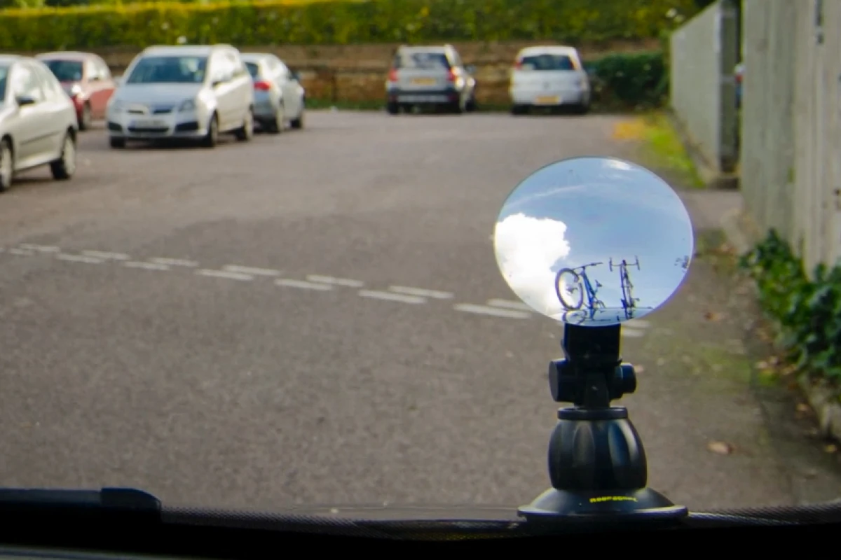 The RoofScope mounts on the hood, and is viewed from the driver's seat