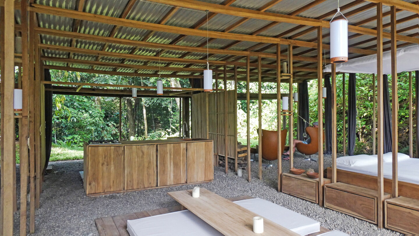 The open jungle house kitchen area is at the center of the house.