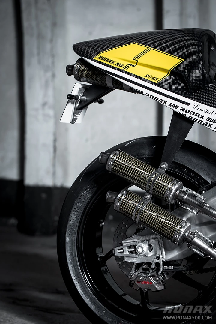 The exhaust system looks like it was designed to spray oil on the license plate
