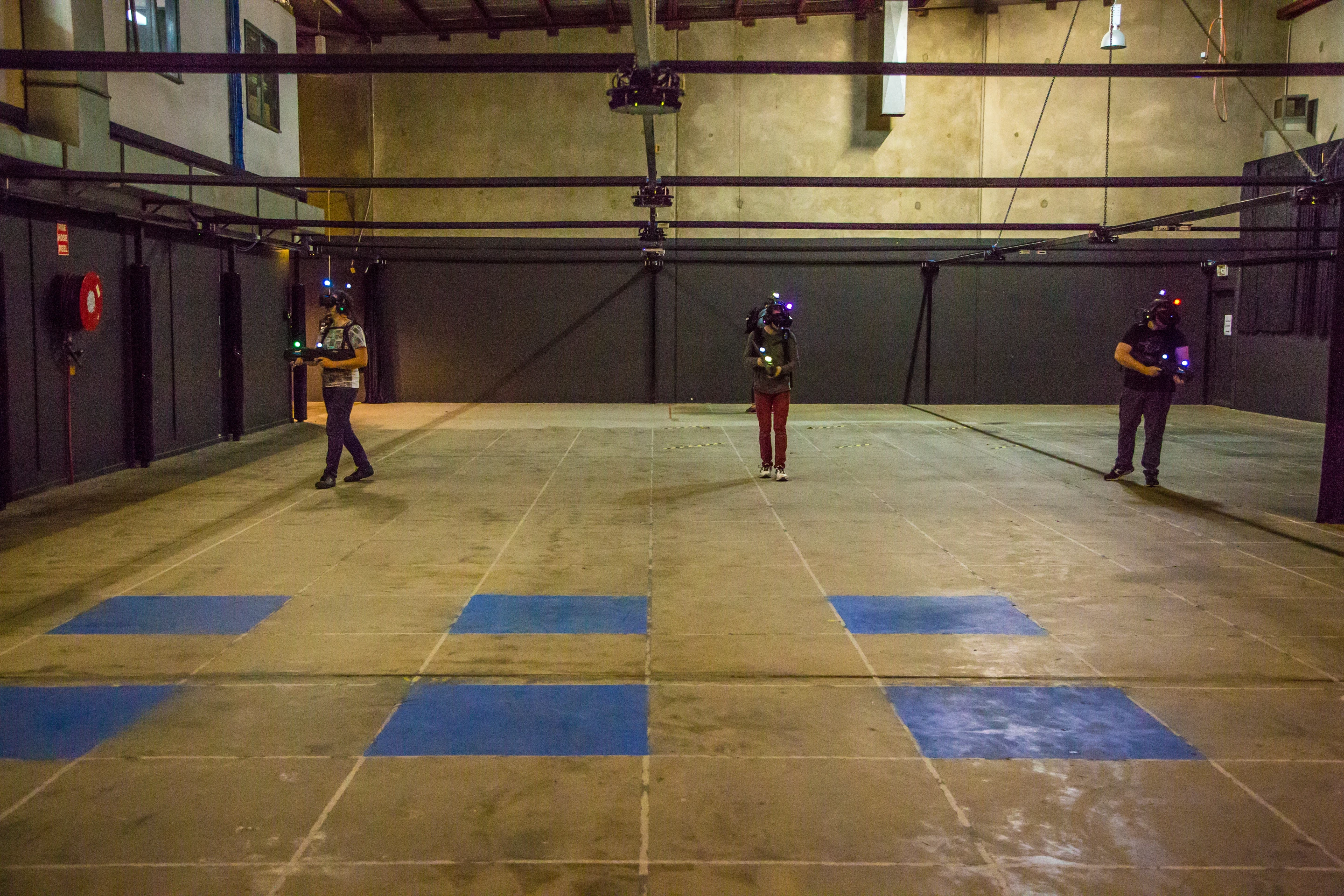 The warehouse space is repurposed several times, as the levels load to different virtual environments