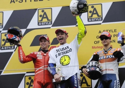 Stoner, Rossi and Pedrosa on the A-style podium