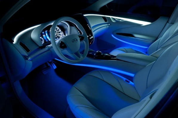 The interior is highlighted by blue LED lighting