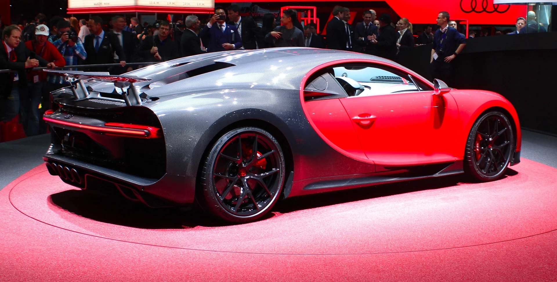 From this angle, the carbon fiber additions to the Chiron Sport can be seen in the rear quarter of the car